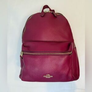 Like New: Coach Pebbled Leather Backpack in Berry